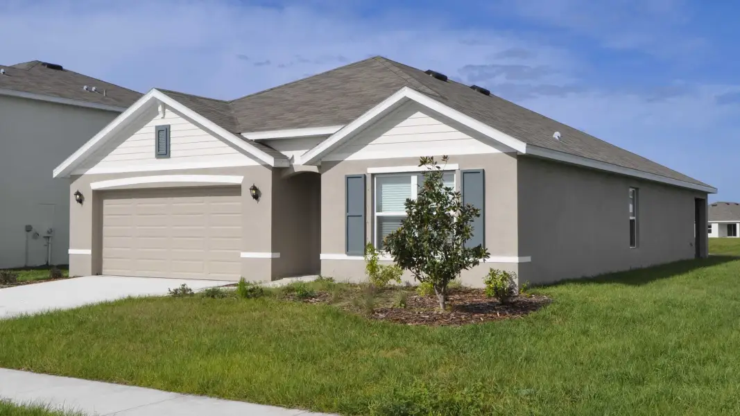 Front exterior of a home in the Curiosity Creek community, located in Palmetto, FL (Image 9).