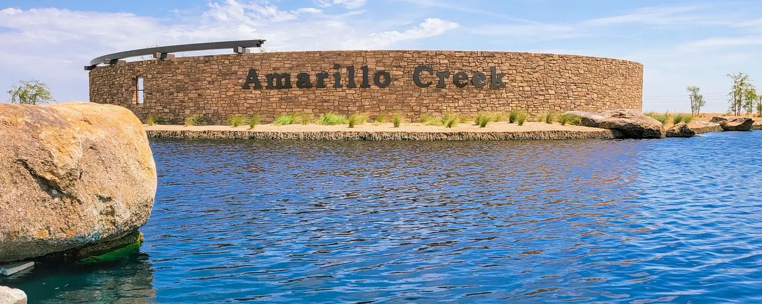 Main entrance to the Amarillo Creek master-planned community in Maricopa, AZ, featuring its landmark signage (Image 5). Main entrance to the Amarillo Creek master-planned community in Maricopa, AZ, featuring its landmark signage (Image 5).