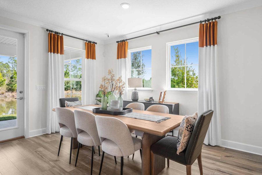 Furnished interior in a model home at Tributary 70' in Yulee (Image 9).