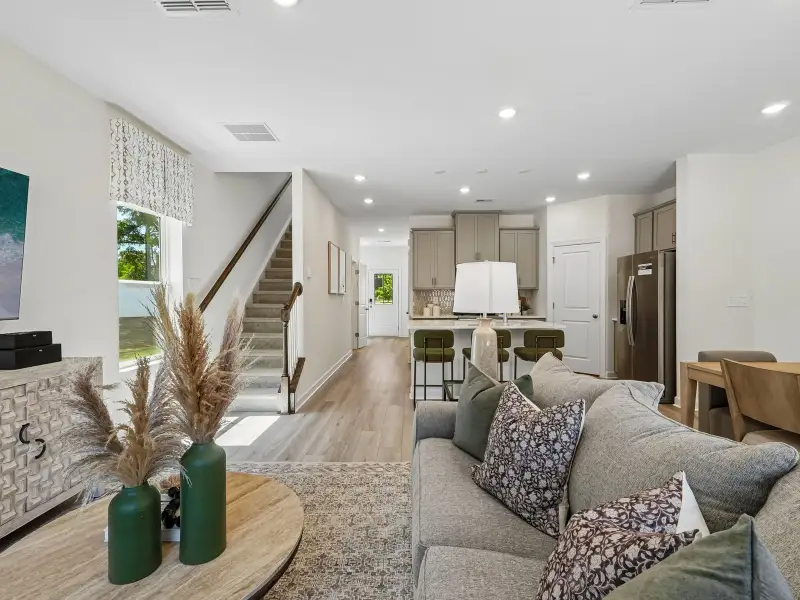 Furnished interior in a model home at Rocky River Towns in Charlotte (Image 4).
