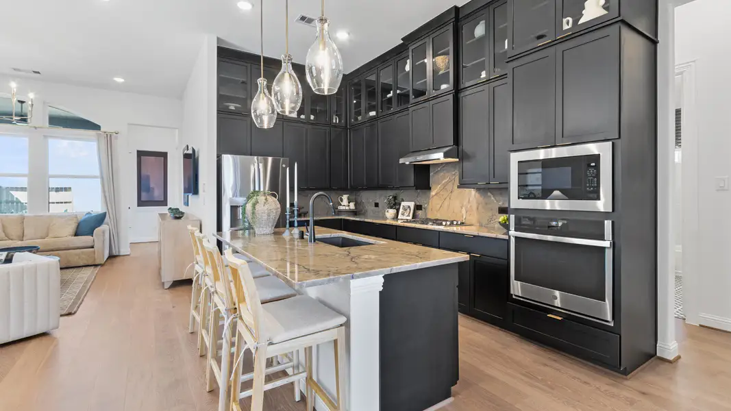 Furnished interior in a model home at Wildrye in Waller (Image 5).