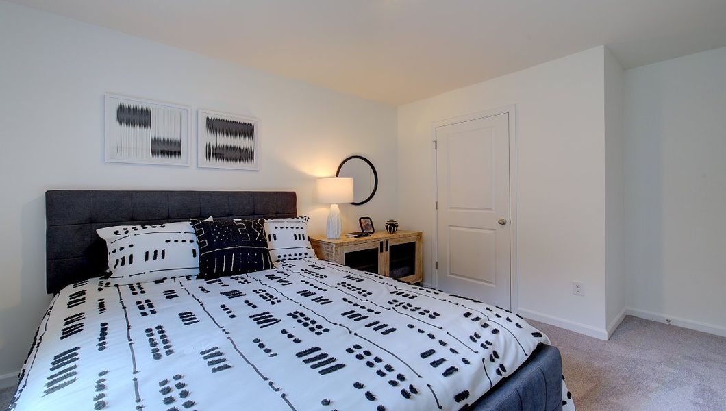 Furnished interior in a model home at Heritage Park in Fletcher (Image 38).