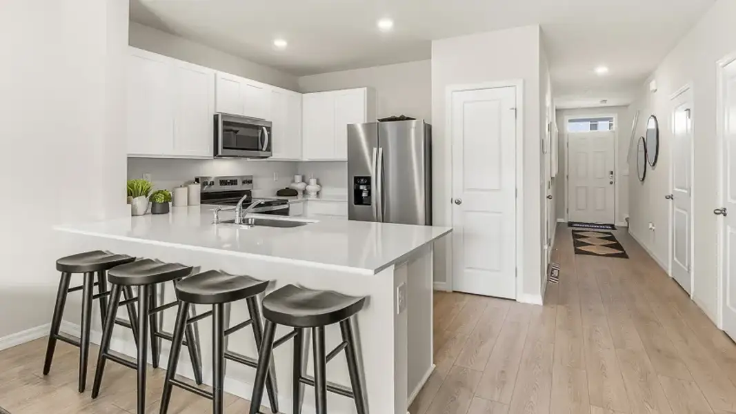 Furnished interior in a model home at Sage Park in Sarasota (Image 7).
