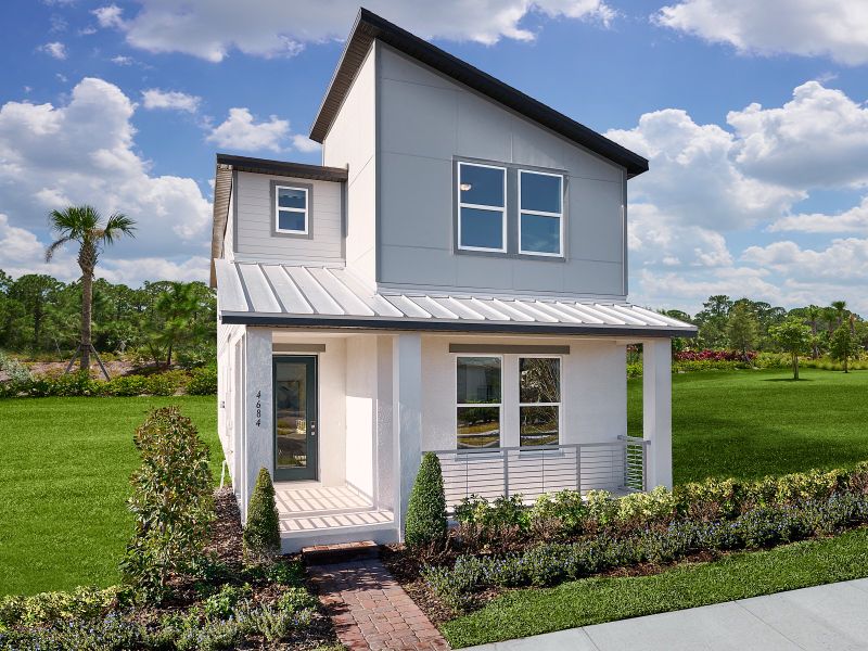 Front exterior of a home in the The Meadow at Crossprairie Bungalows community, located in St. Cloud, FL (Image 5).
