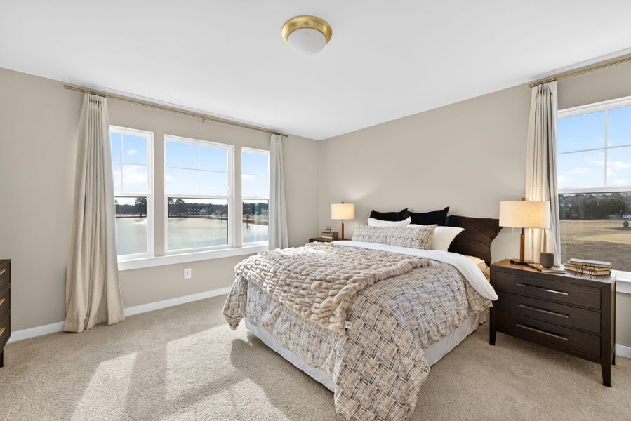 Furnished interior in a model home at North District at Flowers Plantation Townhomes in Clayton (Image 17).