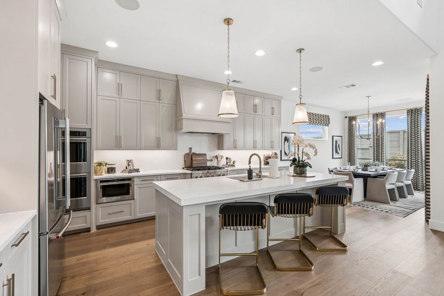 Designer Kitchen with Oversized Island and Casual Dining Designer Kitchen with Oversized Island and Casual Dining