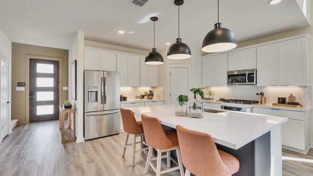 Furnished interior in a model home at Creeks Crossing in Elgin (Image 20).