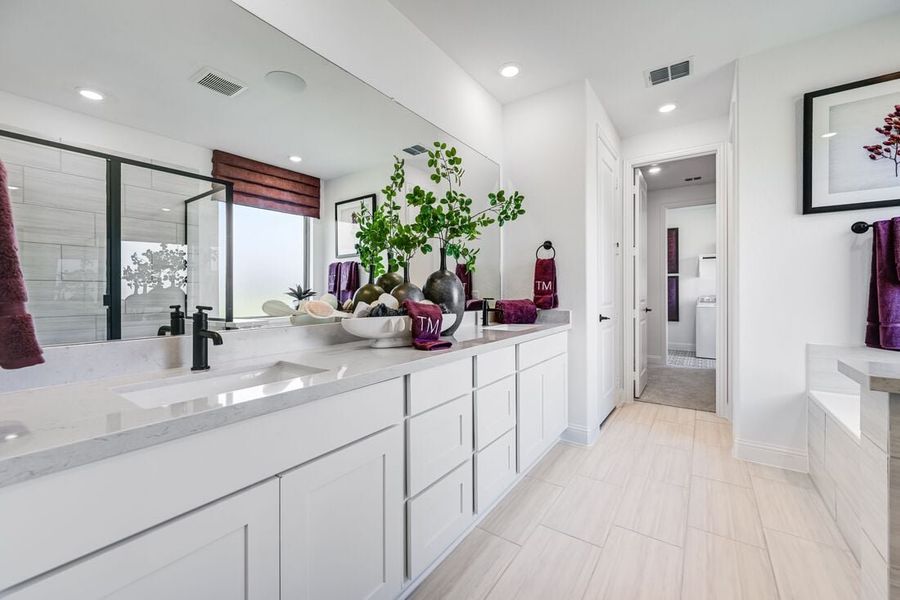 Furnished interior in a model home at South Oak 50s in Oak Point (Image 77).