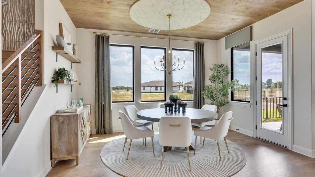 Experience sophistication with wood ceiling, grand windows, and chic decor at Lakeside Meadows' Preserve. Experience sophistication with wood ceiling, grand windows, and chic decor at Lakeside Meadows' Preserve.
