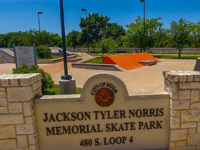 Entrance to the Turner's Crossing - Reserve Collection community in Buda, TX, featuring signage and landscaping (Image 14). Entrance to the Turner's Crossing - Reserve Collection community in Buda, TX, featuring signage and landscaping (Image 14).