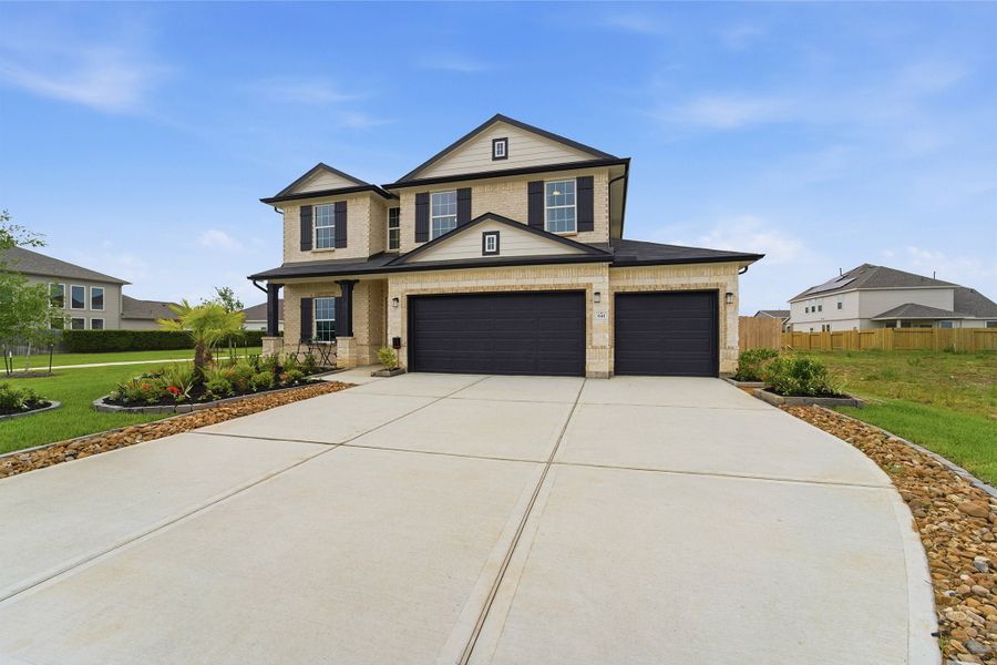 Front exterior of a home in the Trails at Woodhaven Lakes community, located in La Marque, TX (Image 2).