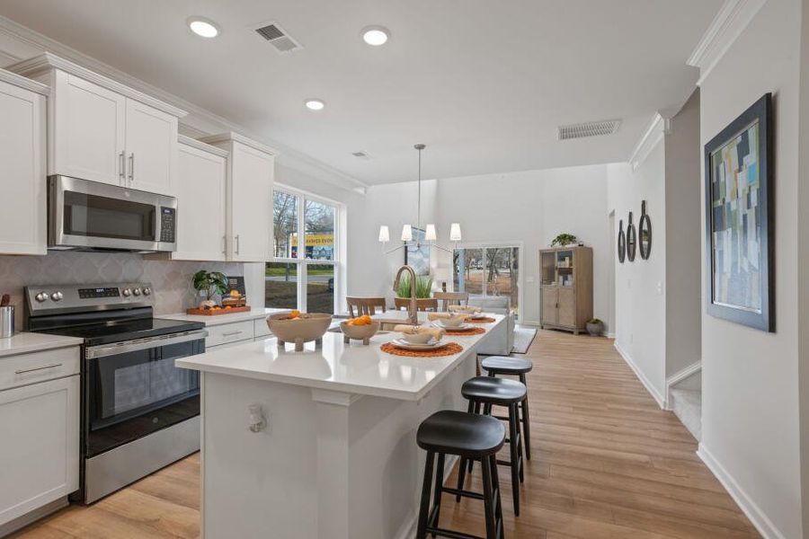 Furnished interior in a model home at East Main Townes in Spartanburg (Image 9).