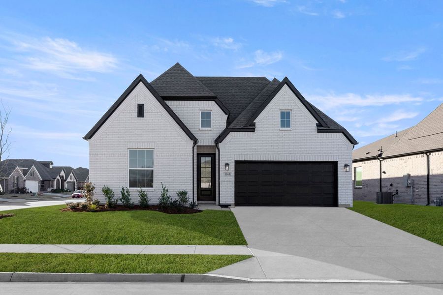 Front exterior of a home in the West Crossing community, located in Anna, TX (Image 4).