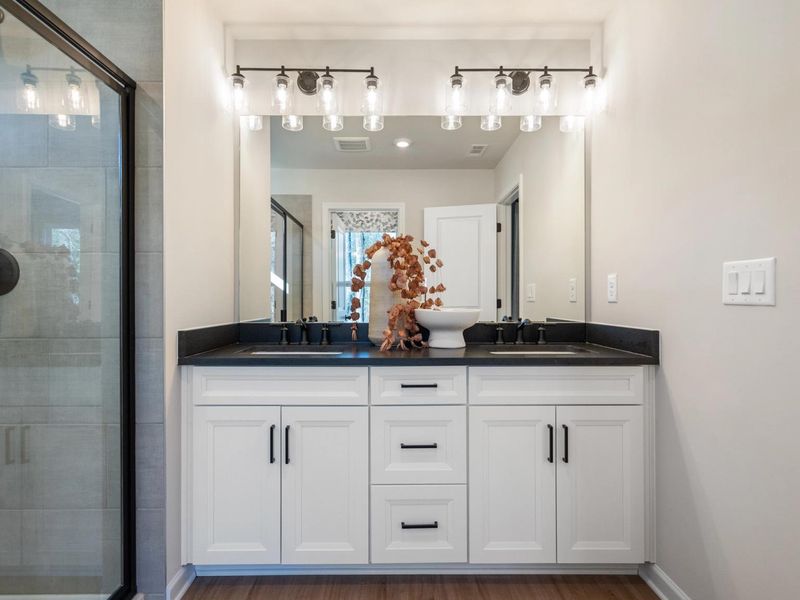 Furnished interior in a model home at The Village at Shallowford in Kennesaw (Image 15).