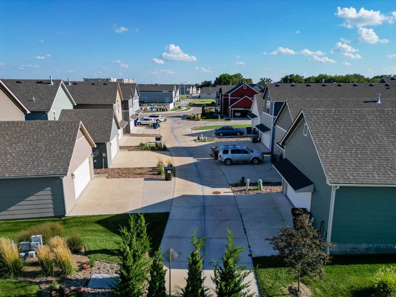 Aerial view of the Heritage Commons community in Andover, KS, showing layout and nearby surroundings (Image 15). Aerial view of the Heritage Commons community in Andover, KS, showing layout and nearby surroundings (Image 15).