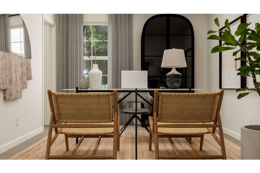A dining room with a table and chairs.