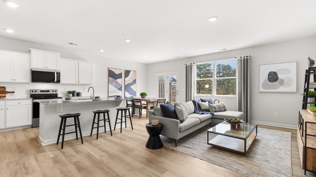 Furnished interior in a model home at Carlton in Douglasville (Image 18).