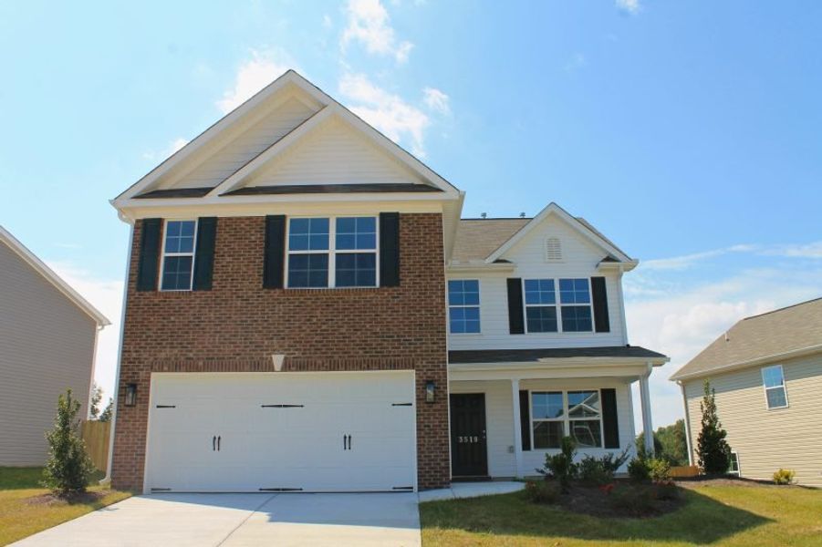 Front exterior of a home in the The Wilcox community, located in Greensboro, NC (Image 17).