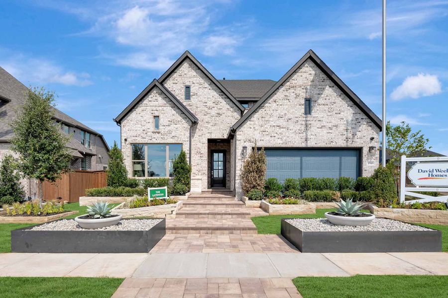 Front exterior of a home in the Sandbrock Ranch community, located in Aubrey, TX (Image 1). Front exterior of a home in the Sandbrock Ranch community, located in Aubrey, TX (Image 1).