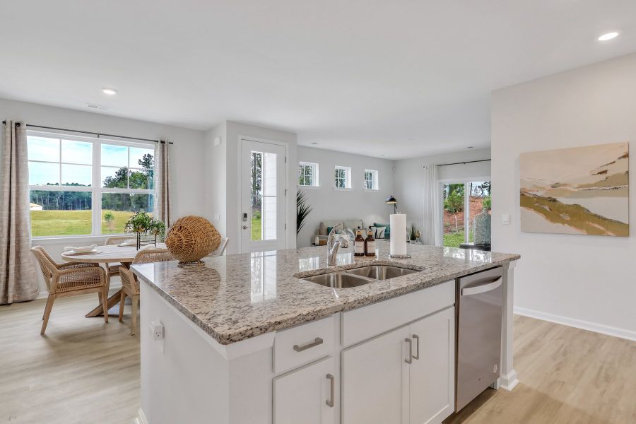 Furnished interior in a model home at Westbrook Retreat Villas at Savannah Quarters in Pooler (Image 14).