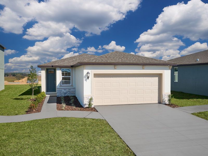 Front exterior of a home in the Benton Hills - Premier Series community, located in Brooksville, FL (Image 3).
