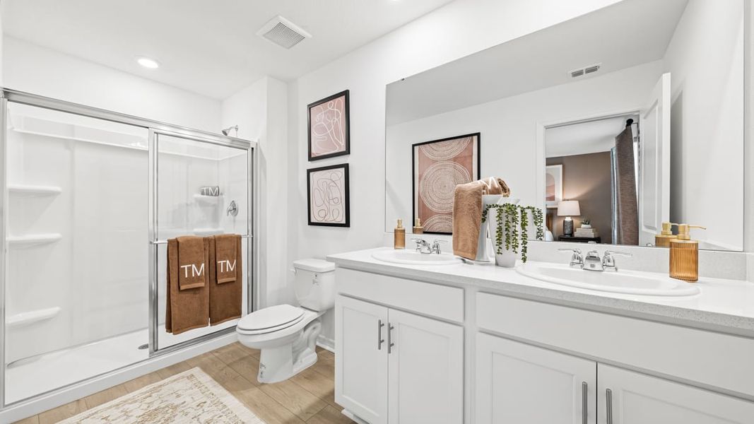 Furnished interior in a model home at The Towns at Tiburon in Nokomis (Image 52).