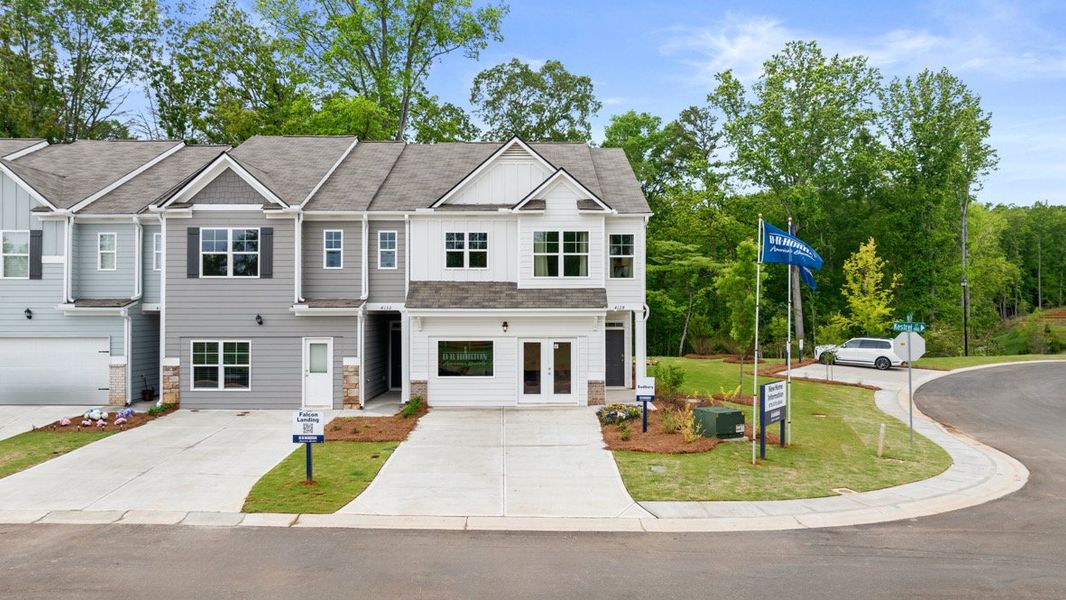 Front exterior of a home in the Falcon Landing Townhomes community, located in Gainesville, GA (Image 2).