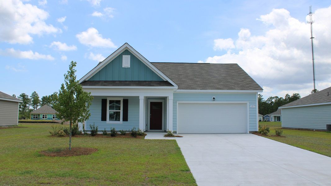 Front exterior of a home in the Rich Square at Brunswick Plantation community, located in Ash, NC (Image 5). Front exterior of a home in the Rich Square at Brunswick Plantation community, located in Ash, NC (Image 5).