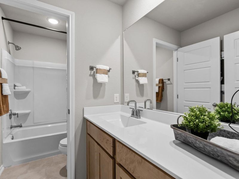 Furnished interior in a model home at Applewhite Meadows in San Antonio (Image 17).