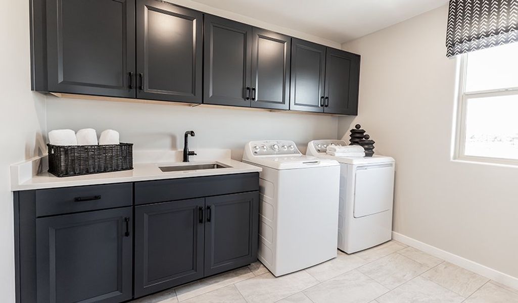 Furnished interior in a model home at Desert Bloom at Monarch in Marana (Image 15).