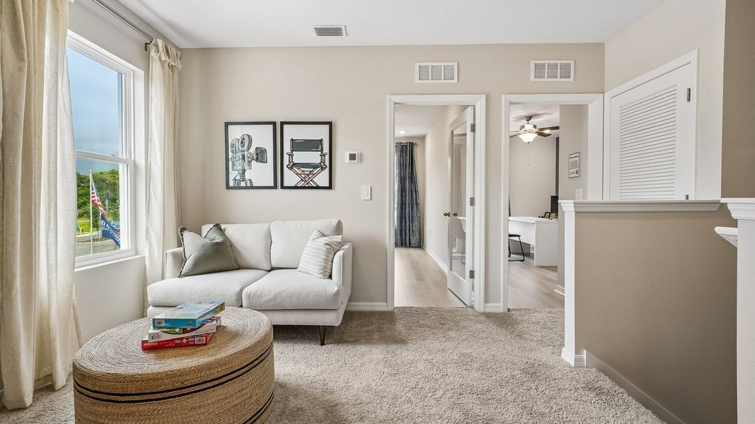 Furnished interior in a model home at Waterstone in Tampa (Image 35).