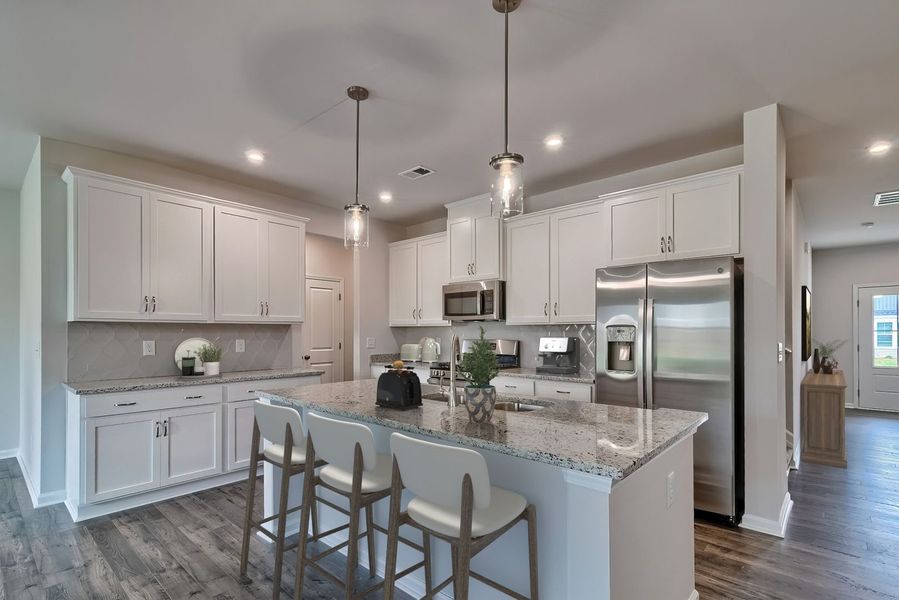 Modern kitchen with stainless steel appliances and ample counter space