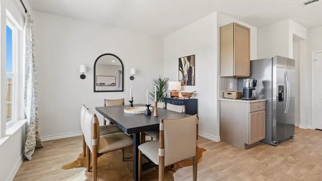 Furnished interior in a model home at Saddle Ridge Estates in Lytle (Image 9).