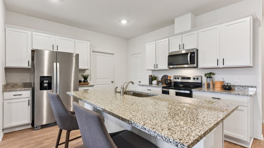 Furnished interior in a model home at Palomino in Manor (Image 21).