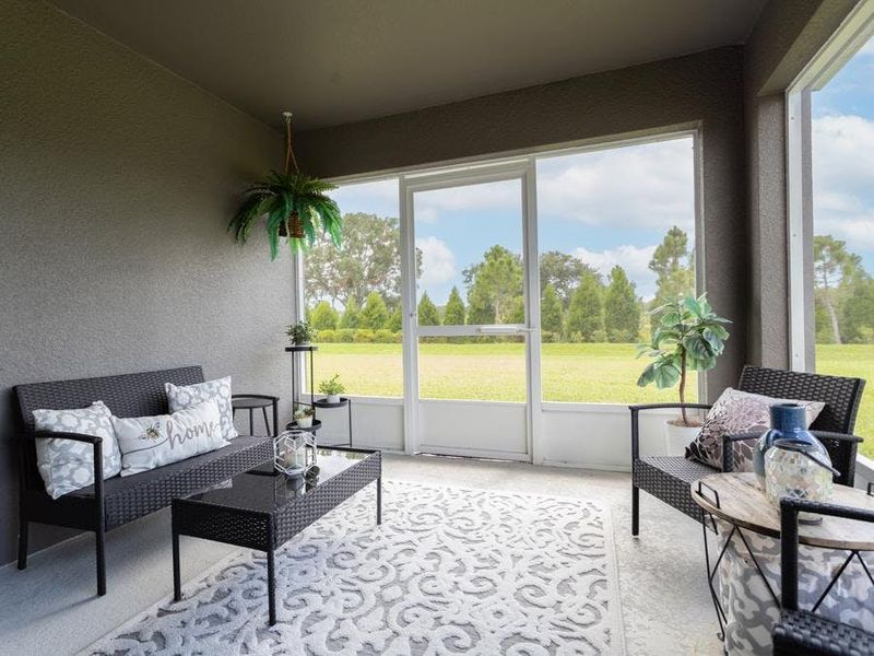 Take in beautiful views and enjoy outdoor living on your covered lanai - Parker model home in Parrish, FL