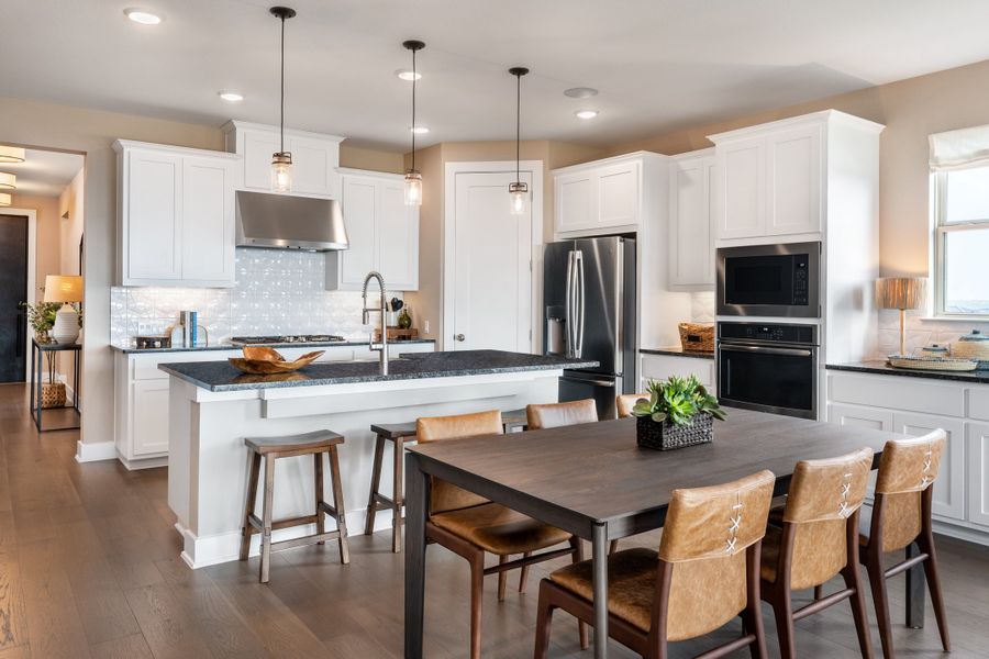 Furnished interior in a model home at Travisso Capri in Leander (Image 6).