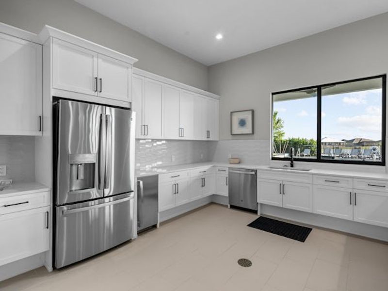 Furnished interior in a model home at BELTERRA in Port St. Lucie (Image 84).