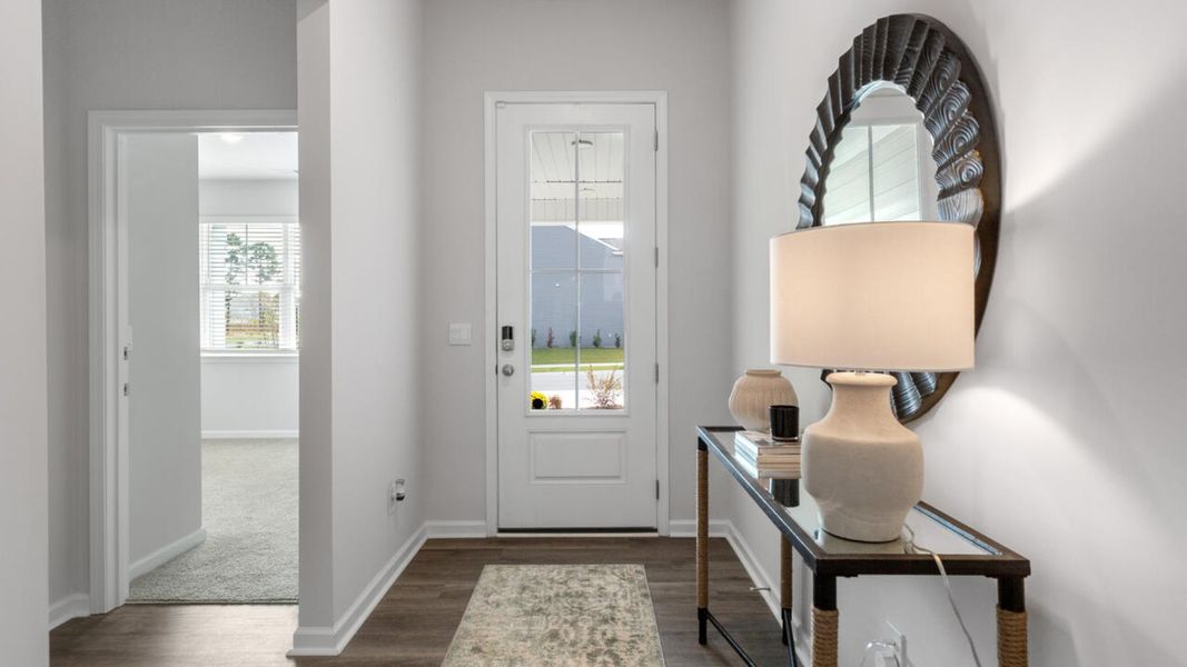 Furnished interior in a model home at Grayson Park in Leland (Image 5).