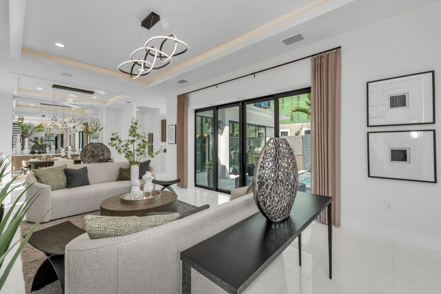 Furnished interior in a model home at Aqua in Bradenton (Image 228).