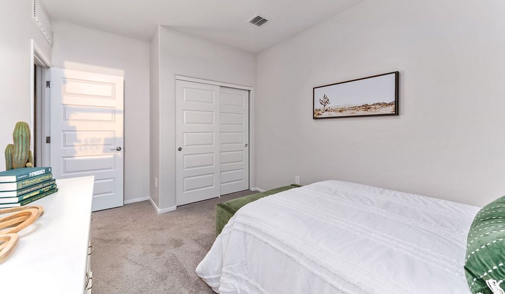 Furnished interior in a model home at Coronet at Gladden Farms in Marana (Image 67).