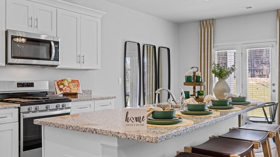 Furnished interior in a model home at Southwind Village in Evans (Image 6). Furnished interior in a model home at Southwind Village in Evans (Image 6).