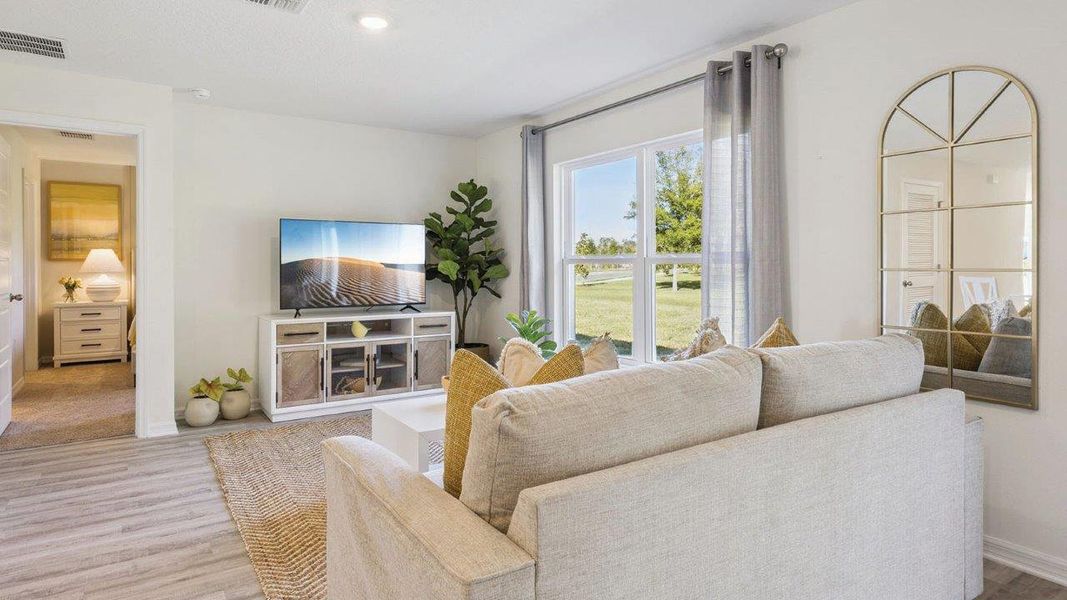 Furnished interior in a model home at Magnolia Pointe in Umatilla (Image 7). Furnished interior in a model home at Magnolia Pointe in Umatilla (Image 7).