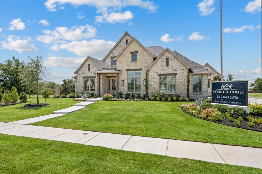 Front exterior of a home in the NorthGlen community, located in Haslet, TX (Image 2). Front exterior of a home in the NorthGlen community, located in Haslet, TX (Image 2).