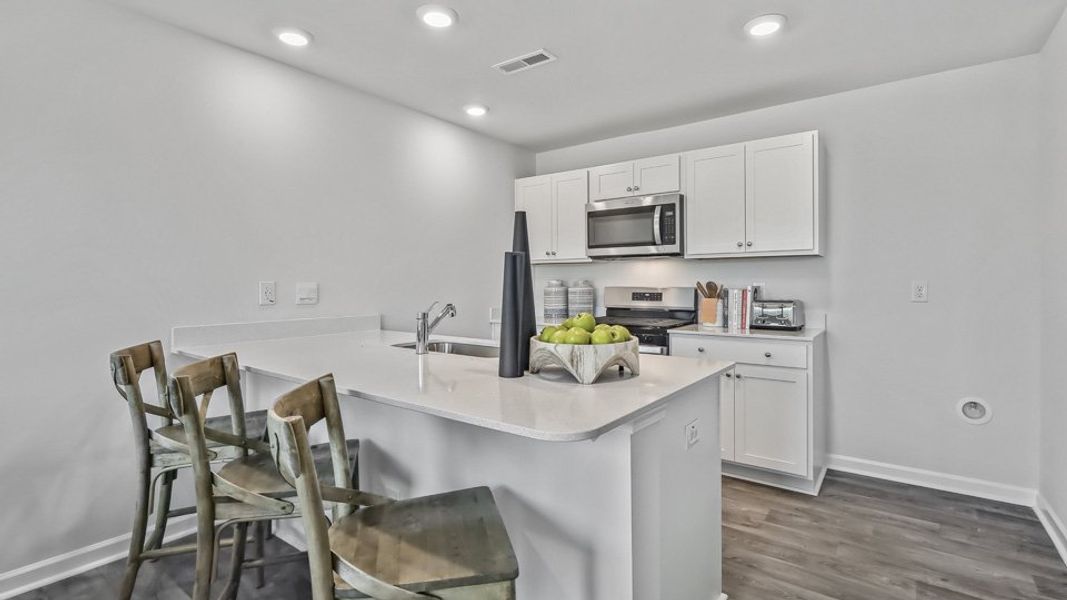 Furnished interior in a model home at The Townes at Honeycutt Oaks in Angier (Image 28).