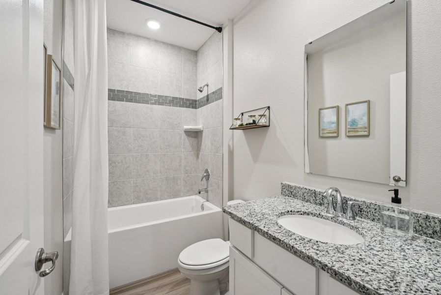 Furnished interior in a model home at Cape Coral Signature in Cape Coral (Image 7). Furnished interior in a model home at Cape Coral Signature in Cape Coral (Image 7).