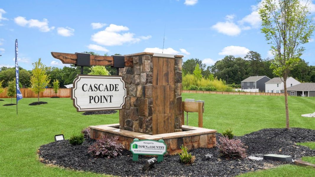 Entrance to the Cascade Point community in Seneca, SC, featuring signage and landscaping (Image 11).