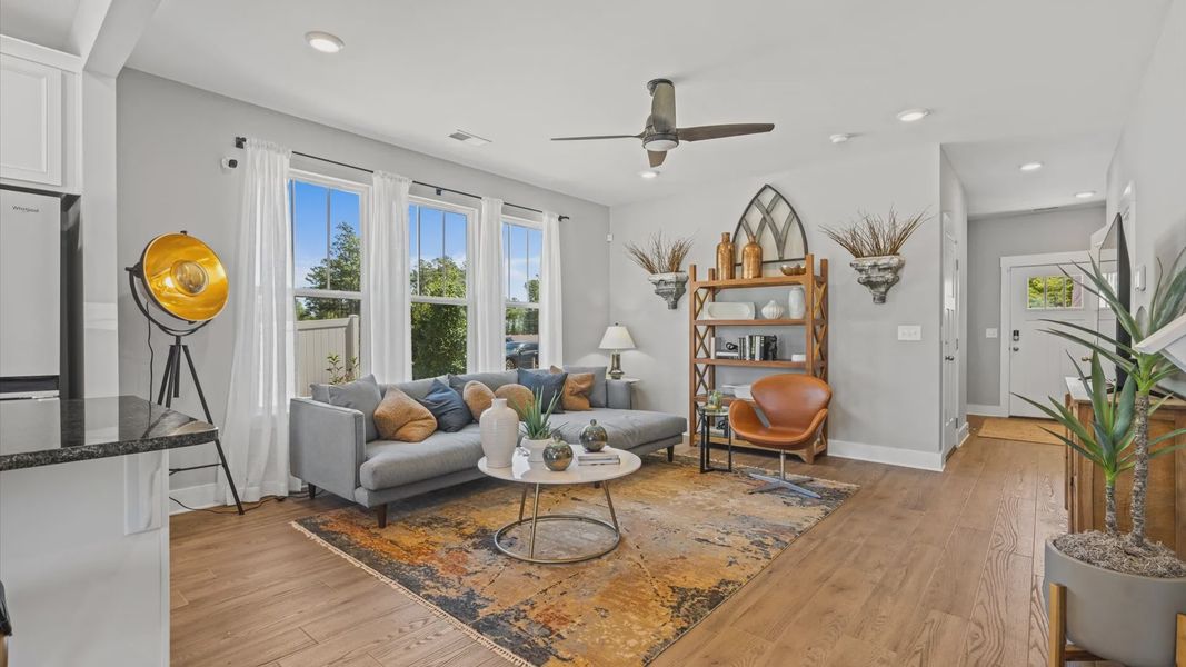 Colorfully decorated family room in two story townhome at Tyger Ridge by DRB Homes in Spartanburg, SC Colorfully decorated family room in two story townhome at Tyger Ridge by DRB Homes in Spartanburg, SC