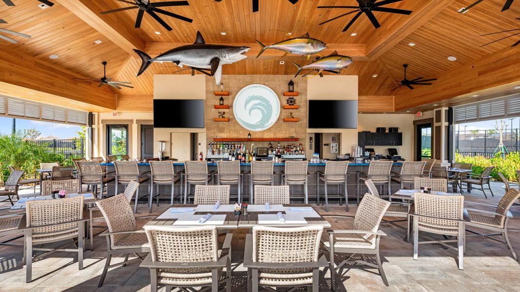 Furnished interior in a model home at Esplanade by the Islands in Naples (Image 20).