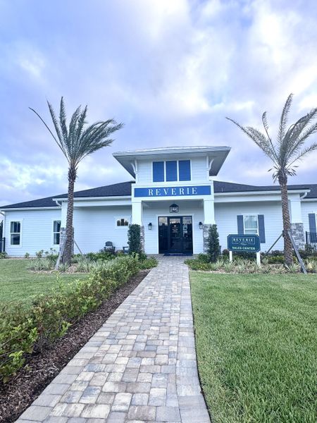 A charming sales center with lush landscaping in Reverie at Silverleaf by Dream Finders Homes (St. Augustine, FL). A charming sales center with lush landscaping in Reverie at Silverleaf by Dream Finders Homes (St. Augustine, FL).