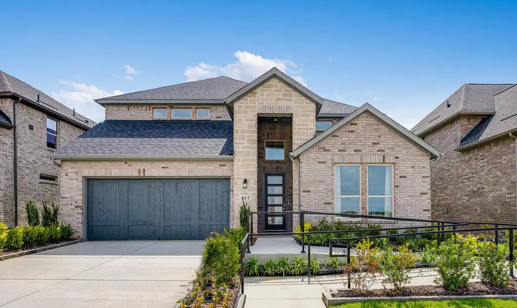 Front exterior of a home in the Cross Creek Meadows 55s community, located in Celina, TX (Image 2).